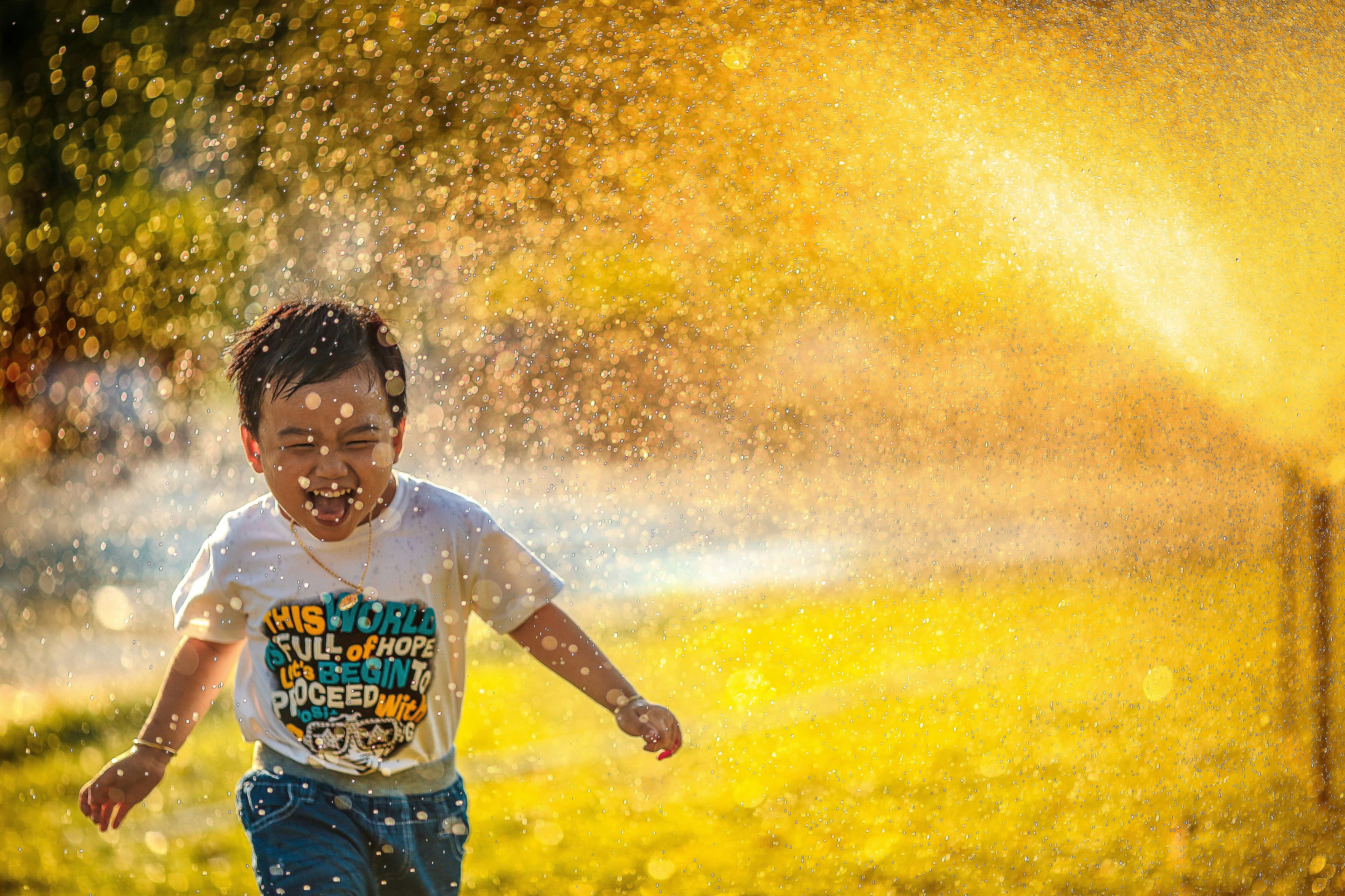 Image of excited kid enjoying the summer.